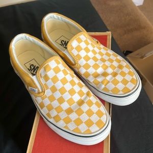 Vans checkered slip ons